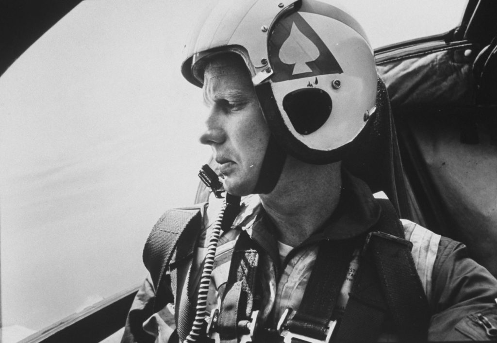 A pilot looking out the window of a plane. (Photo by Bill Ray/The LIFE Picture Collection © Meredith Corporation)