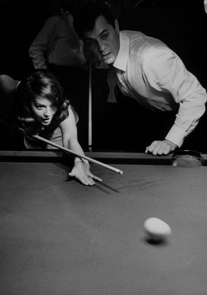 Natalie Wood learns to play billiards with Tony Curtis, 1963.