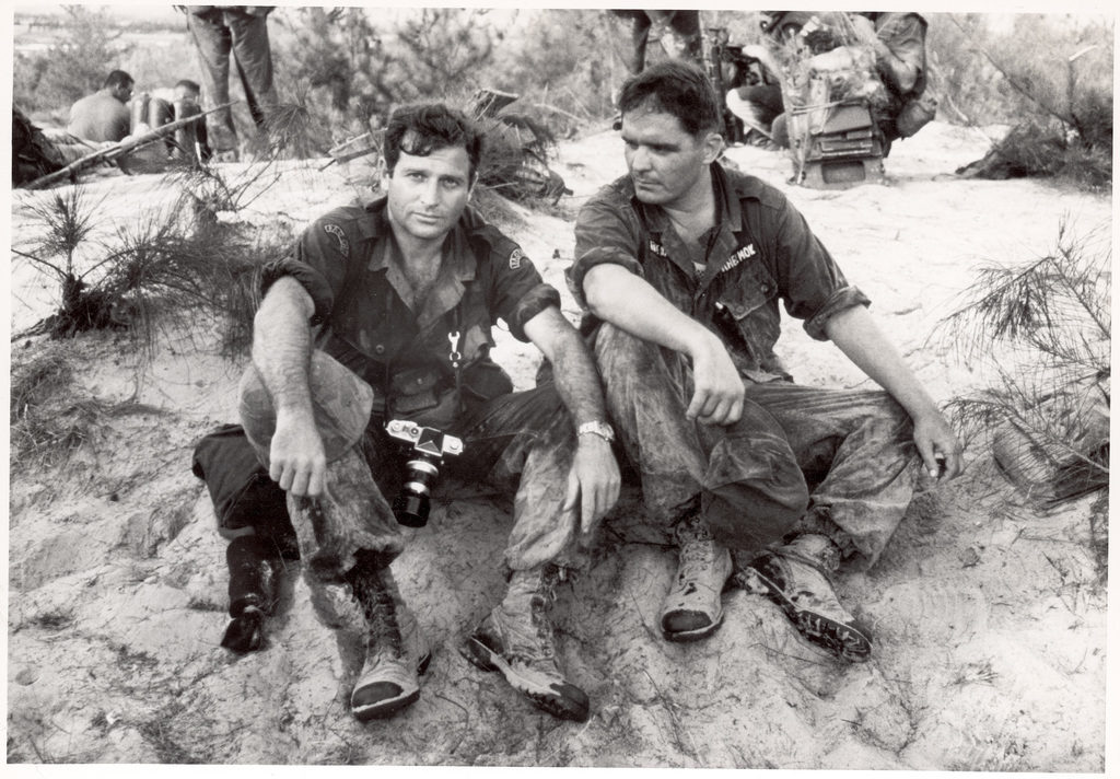 (L-R) LIFE photographer Paul Shutzer and LIFE associate editor Michael Mok on assignment. (Photo by Paul Schutzer/The LIFE Picture Collection © Meredith Corporation)