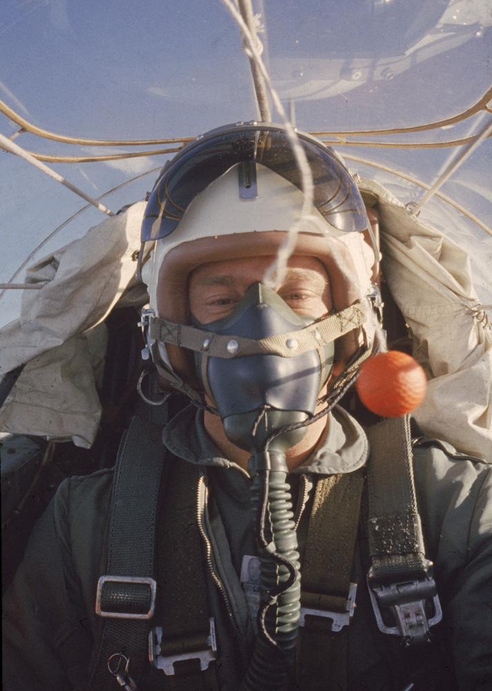 Mercury astronaut Scott Carpenter flies in an F-100F supersonic jet fighter while training in weightlessness.