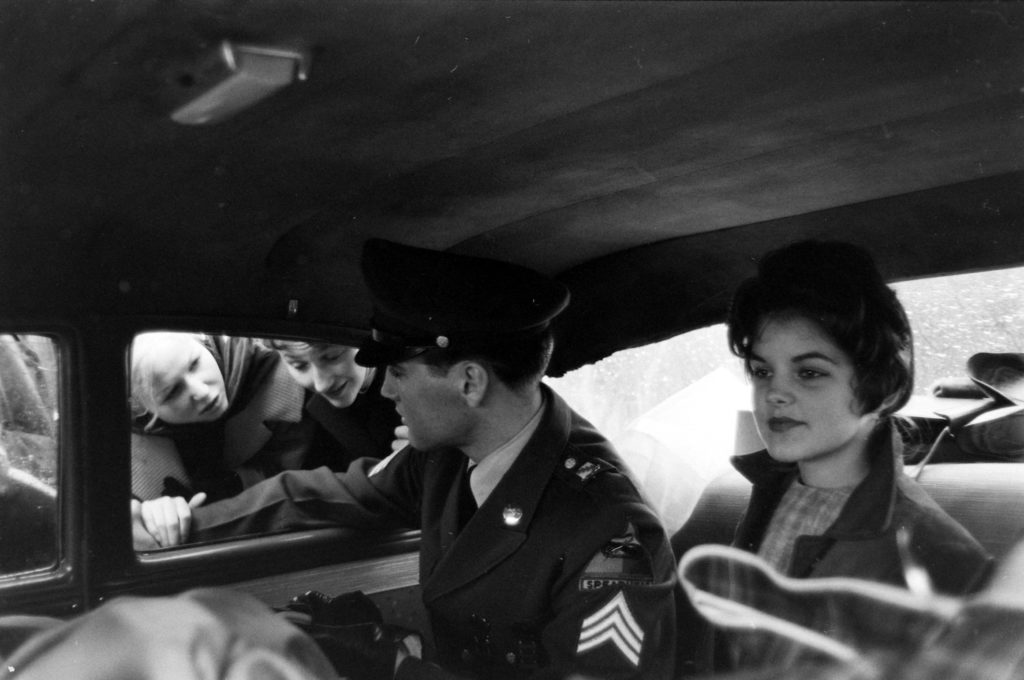 Elvis and Priscilla leave the house he and his family occupied in Bad Nauheim, Germany. (Photo by James Whitmore/The LIFE Picture Collection © Meredith Corporation)