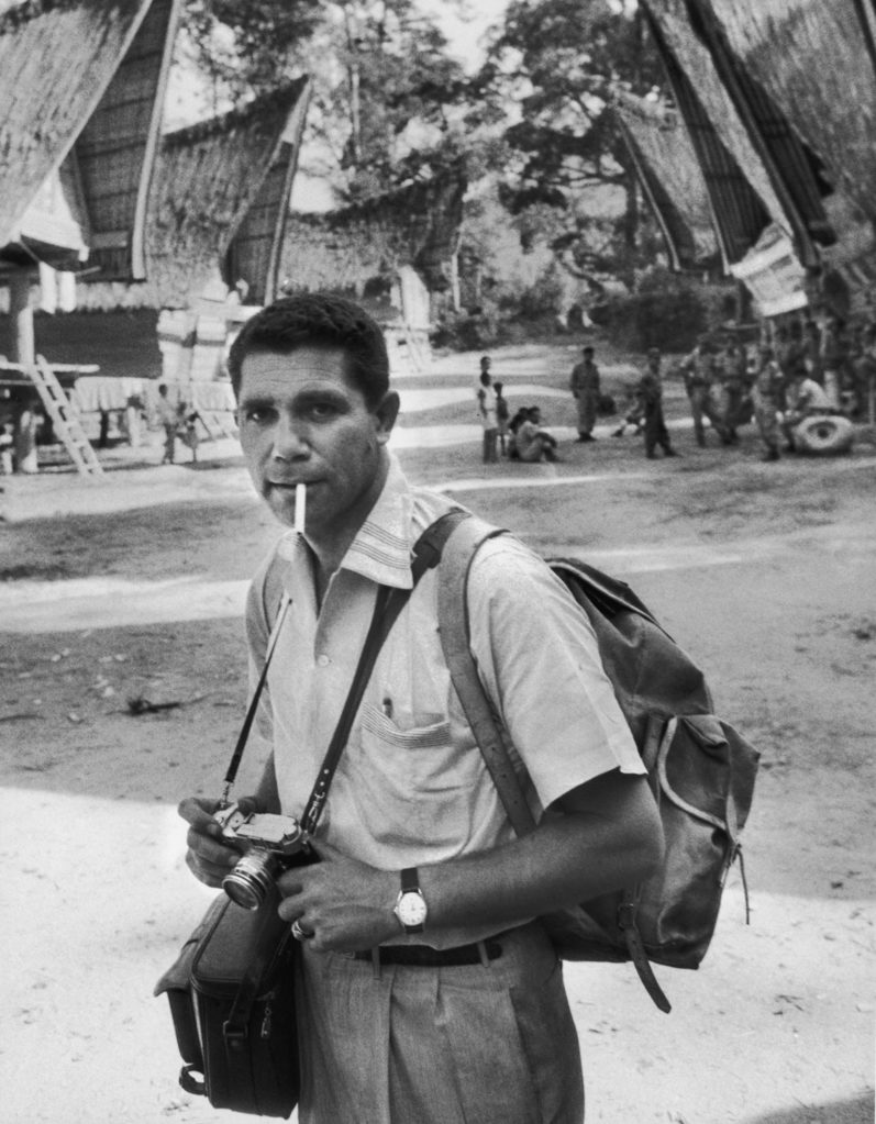 Photographer John Dominis with his camera. (Photo by John Dominis/The LIFE Picture Collection © Meredith Corporation)