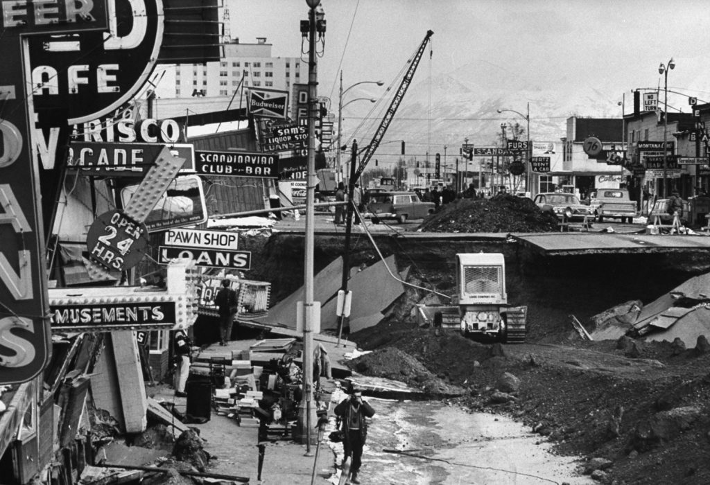 In downtown Anchorage, the buildings and the pavement dropped 20 feet, dividing Fourth Avenue into two levels and leaving a weird jumble of signs.