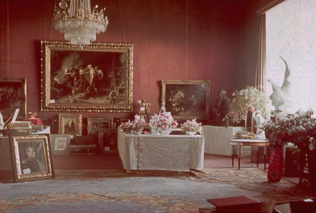 Some of Adolf Hitler's 50th birthday gifts   including flower vases emblazoned with swastikas   stored in a room at the Reich Chancellery, Berlin, April 1939.