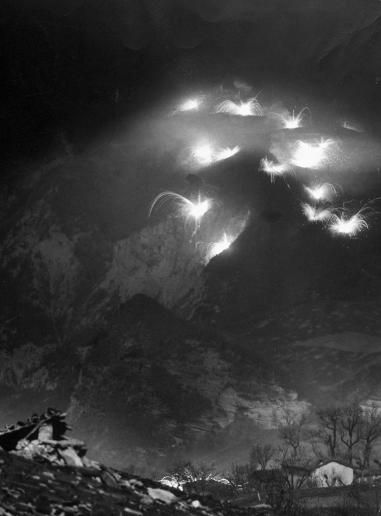 An Allied artillery barrage at night, the Italian front, 1944.