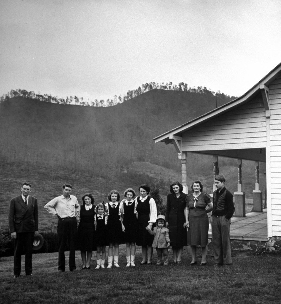 Carter family (L-R) A.P., Ezra, Maybelle, Anita, June, Helen, Sara, Flo Millard (A.P. and Sara's granddaughter), Gladys Carter Millard, Margaret Addington (Maybelle's mother), and Joe.