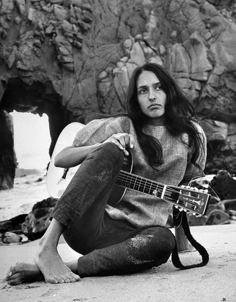 Folk singer Joan Baez on the beach near her home in Carmel, California, in 1962.