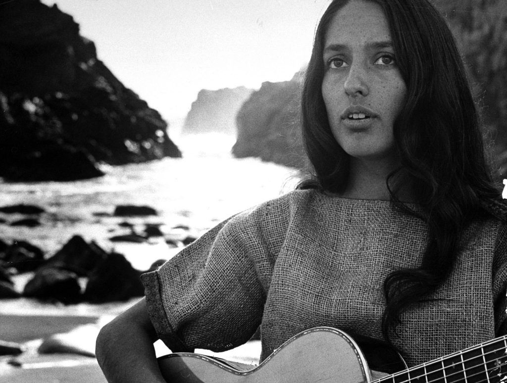 Folk singer Joan Baez on the beach near her home in Carmel, California, in 1962.