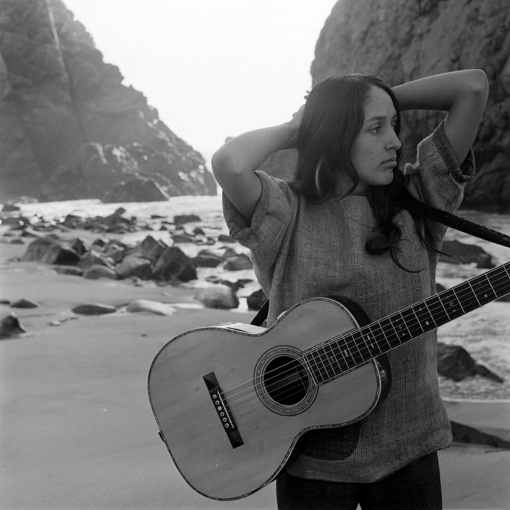 Folk singer Joan Baez on the beach near her home in Carmel, California, in 1962.