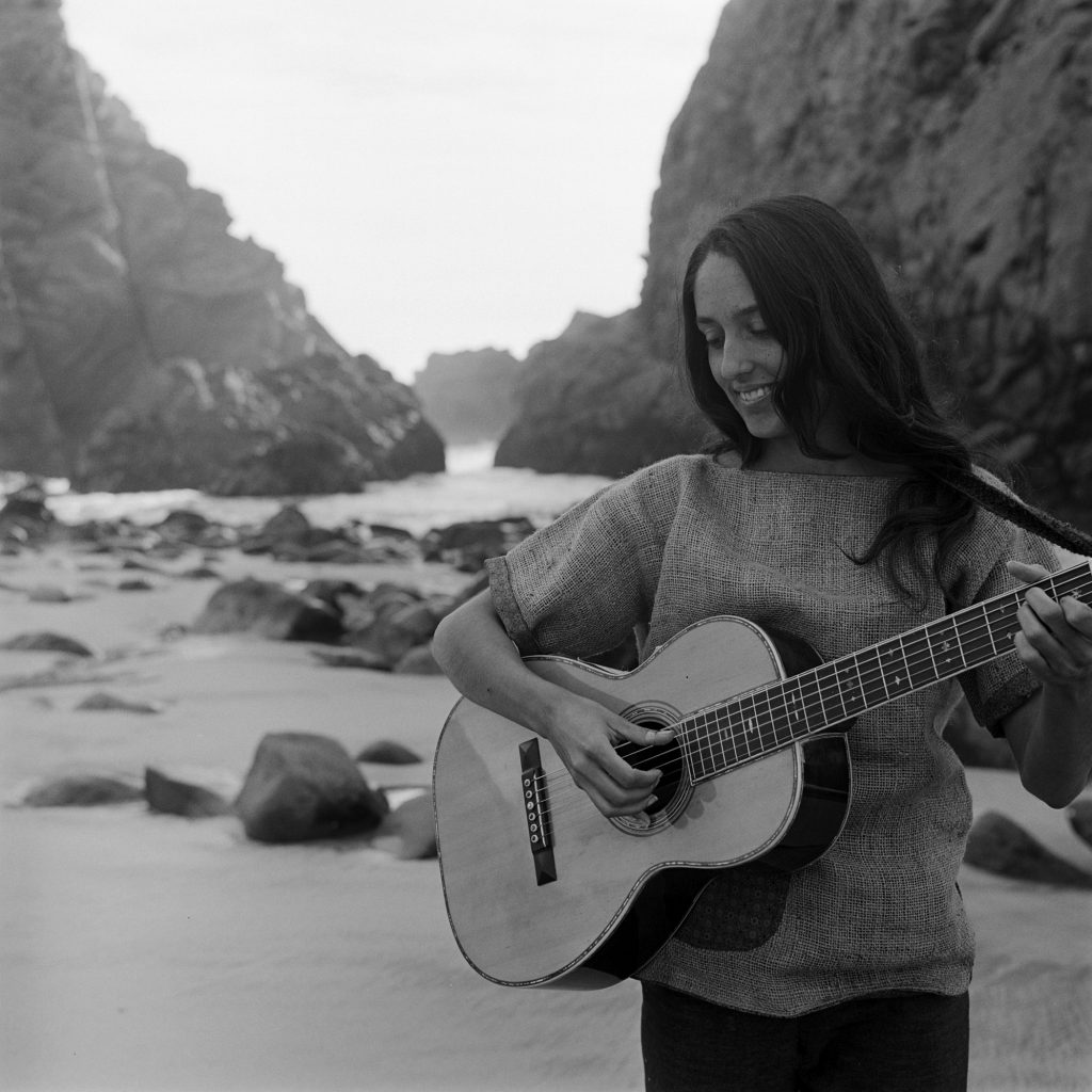 Folk singer Joan Baez on the beach near her home in Carmel, California, in 1962.