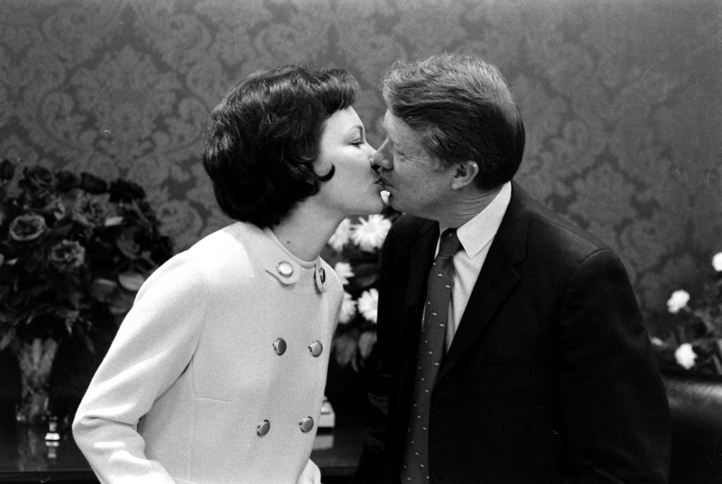 Georgia Govenor Jimmy Carter kissing his wife Rosalynn, 1971.