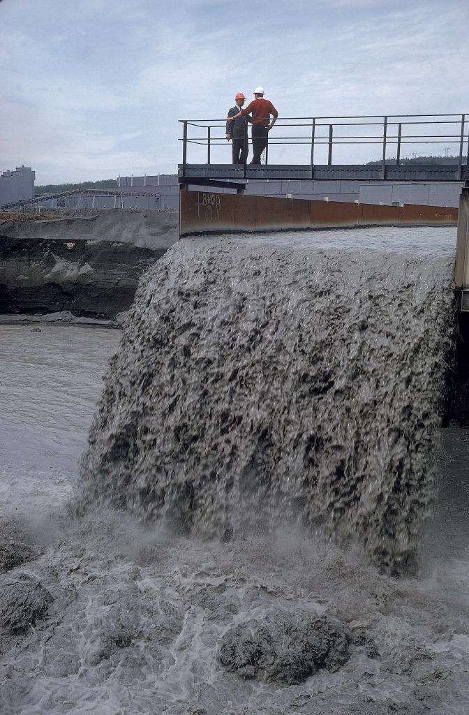 Color photos of pollution in the Great Lakes in 1968.