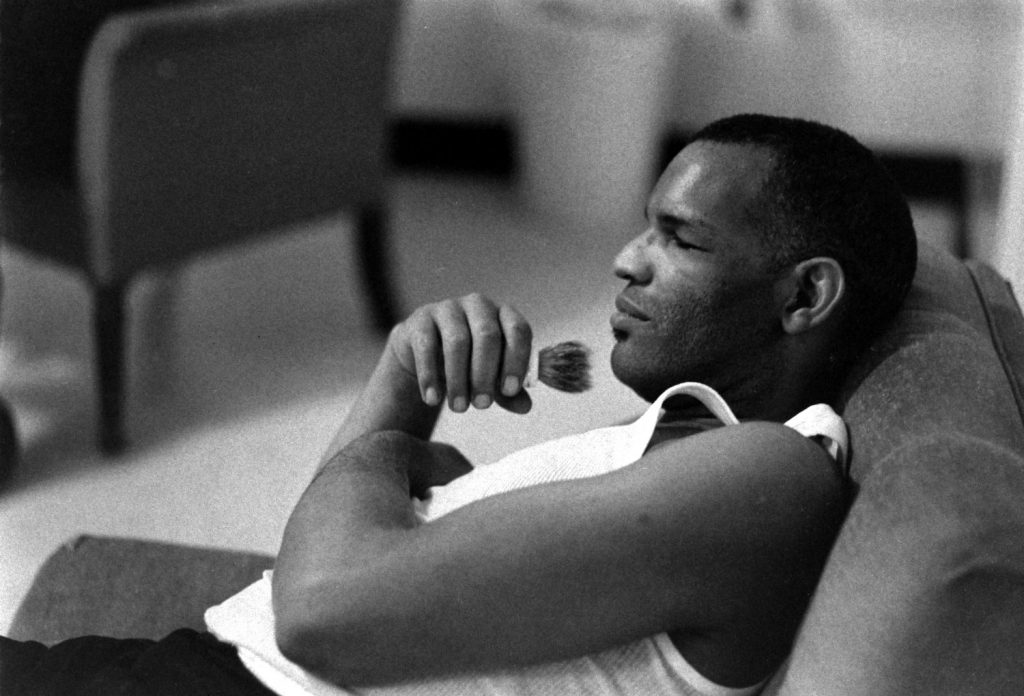 Ray Charles -- without his trademark sunglasses -- rests before a show, 1966.