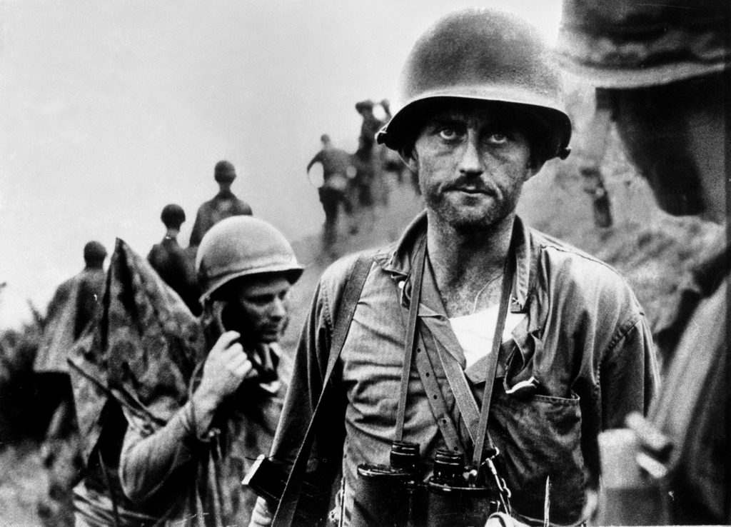 US Marine Captain Francis "Ike" Fenton in despair as he is told that his company is almost out of ammunition while trying to hold off a heavy counter-attack by North Korean forces. (Photo by David Douglas Duncan /The LIFE Images Collection)