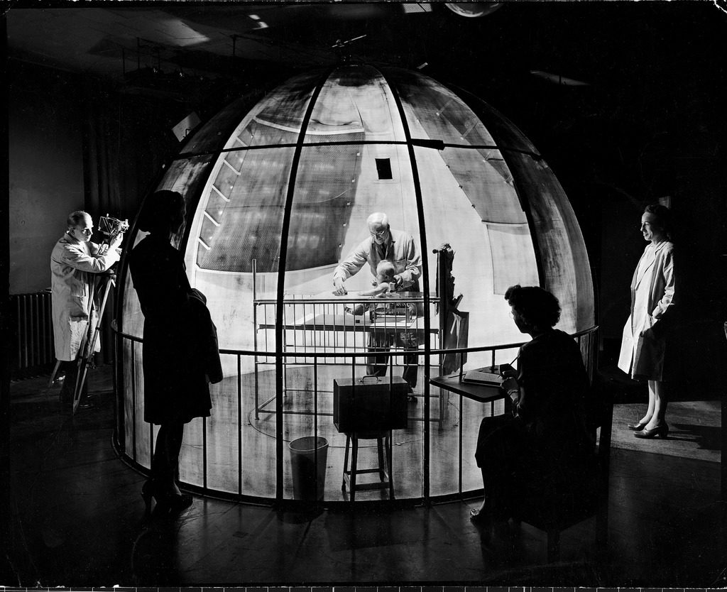 Dr. Arnold Gesell (C) studying baby at Yale's child psychology lab. (Photo by Carl Mydans/The LIFE Picture Collection © Meredith Corporation)