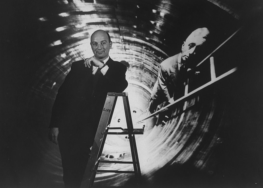 Life photographer Yale Joel standing in front of one of his photographs. (Photo by Gordon Parks/The LIFE Picture Collection © Meredith Corporation)