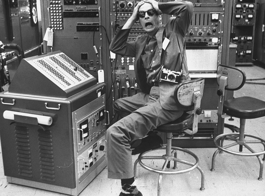 Life photographer Robert Kelley in IBM plant while working on story. (Photo by Robert W. Kelley/The LIFE Picture Collection © Meredith Corporation)