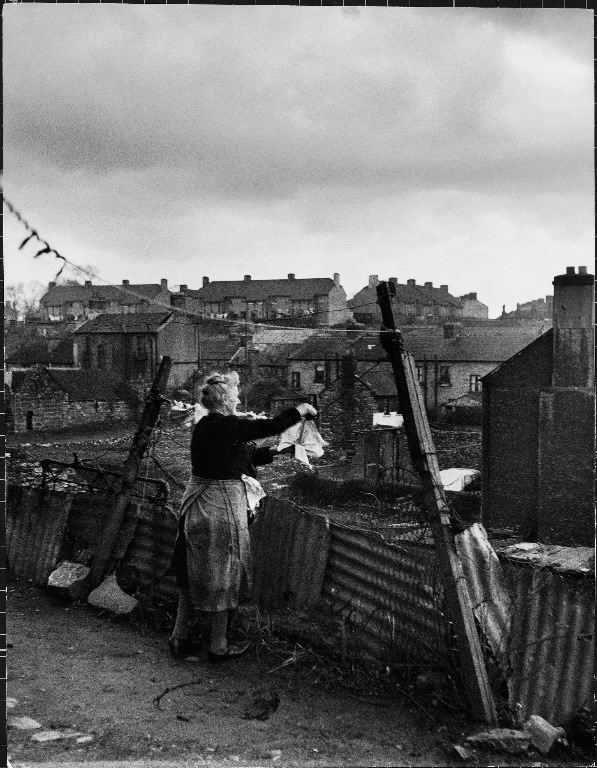 Woman hanging wash in a Dublin slum. (Photo by Anthony Linck/The LIFE Picture Collection © Meredith Corporation)