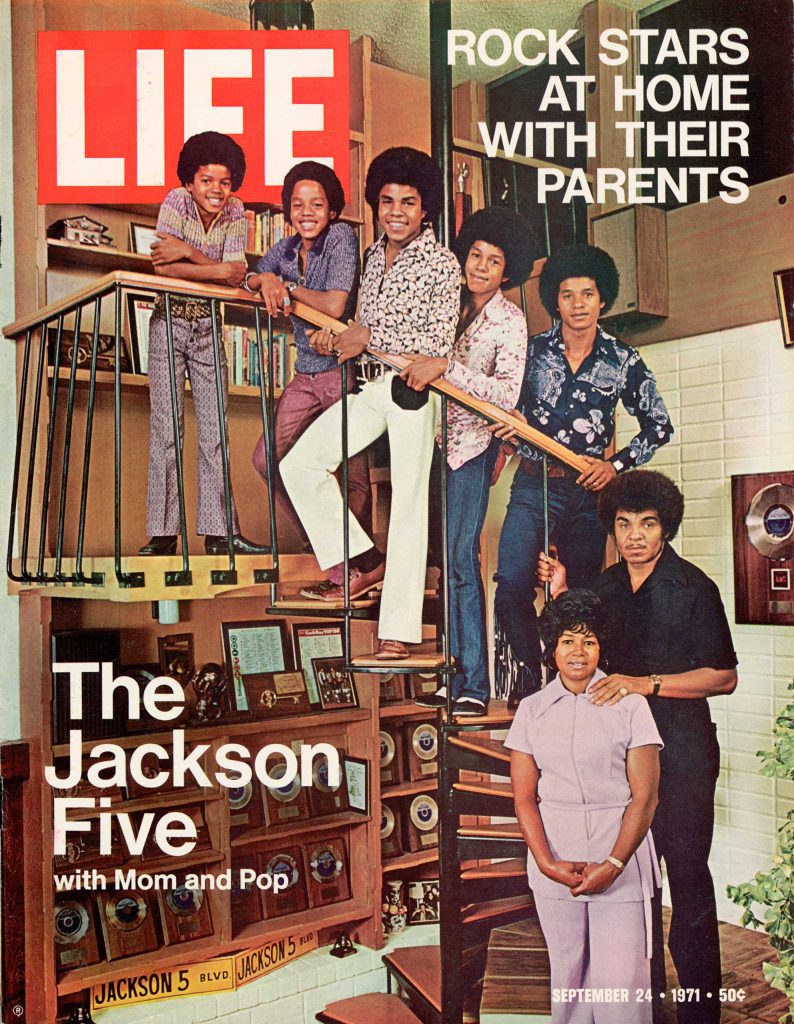 The Jackson 5 pose with their parents in Encino, Calif., in 1970.