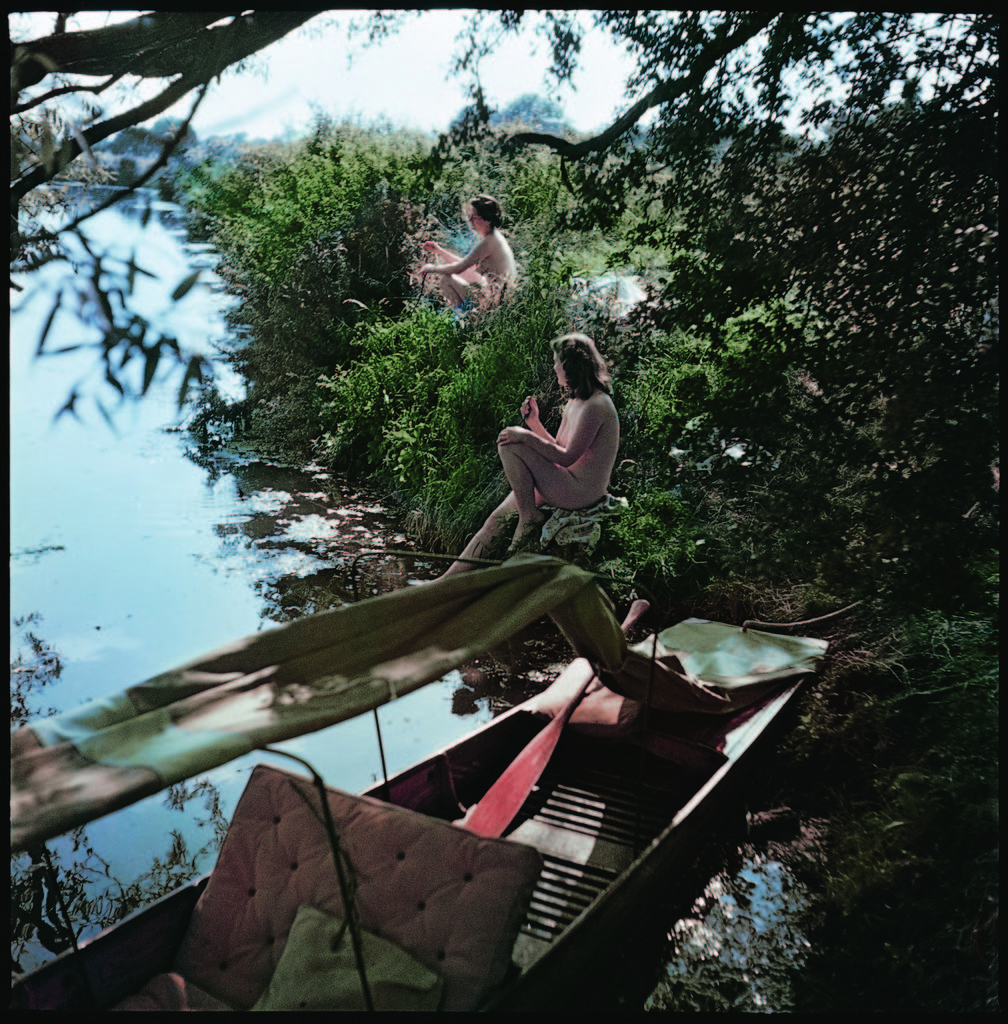 Pair of nude women sitting along the river bank of the Thames river. (Photo by William J. Sumits/The LIFE Picture Collection © Meredith Corporation)